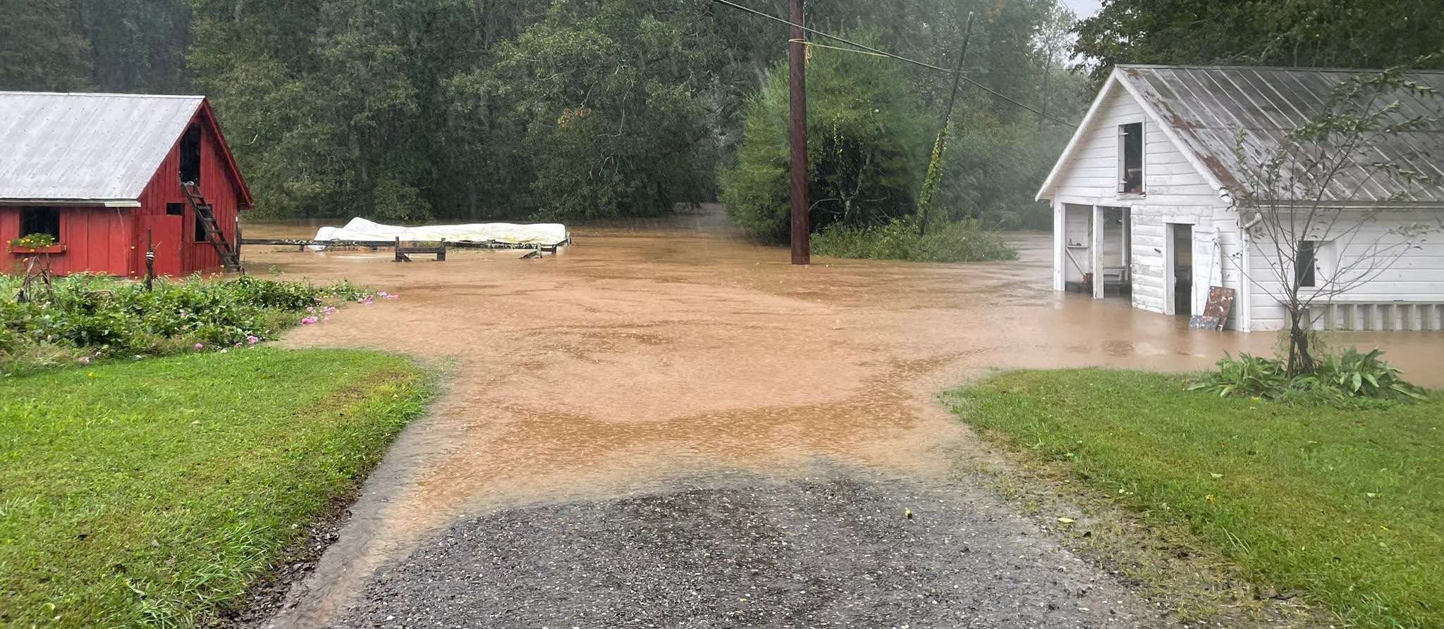 Red and White Barn at Camp Celo during Hurricane Helene